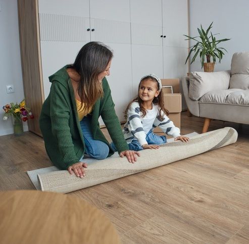 A comfortable living room that feels shaped by daily life and a mother's touch